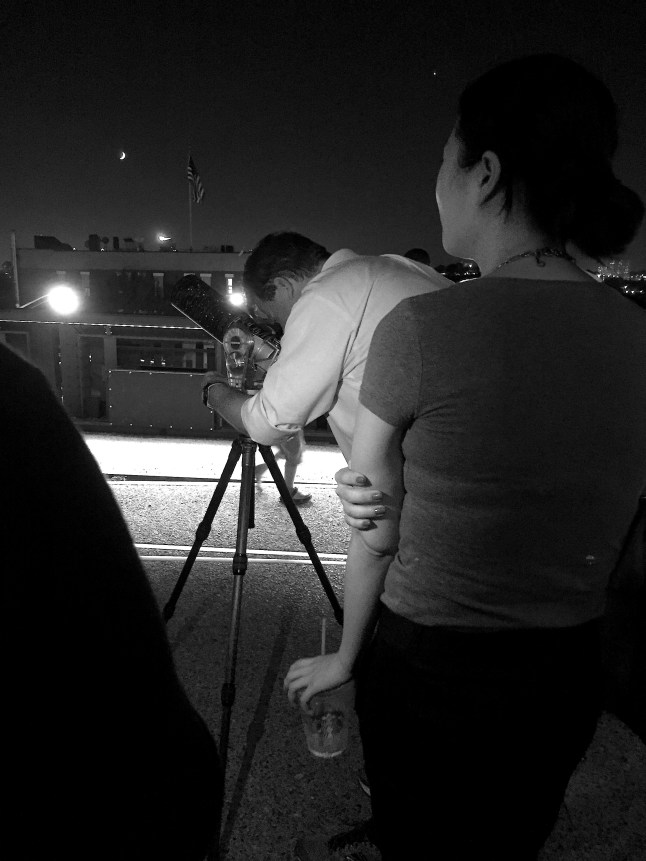 This astronomer –&nbsp;Alric (doesn't that just sound like a stargazer's name?) –&nbsp;preps his telescope for us to look at Saturn. I couldn't believe we could actually see the planet with it's ring around it! Alric told me that the first time he showed his dad the same thing, he was so surprised he fell off the back porch.